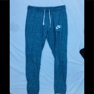 Grey Nike sweatpants.